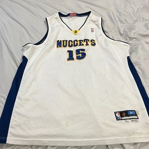 It’s a jersey of Carmelo Anthony early days and it’s been WORN.